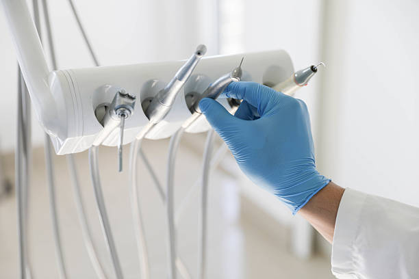 Professional Tooth Extraction technician working in Choctaw, OK